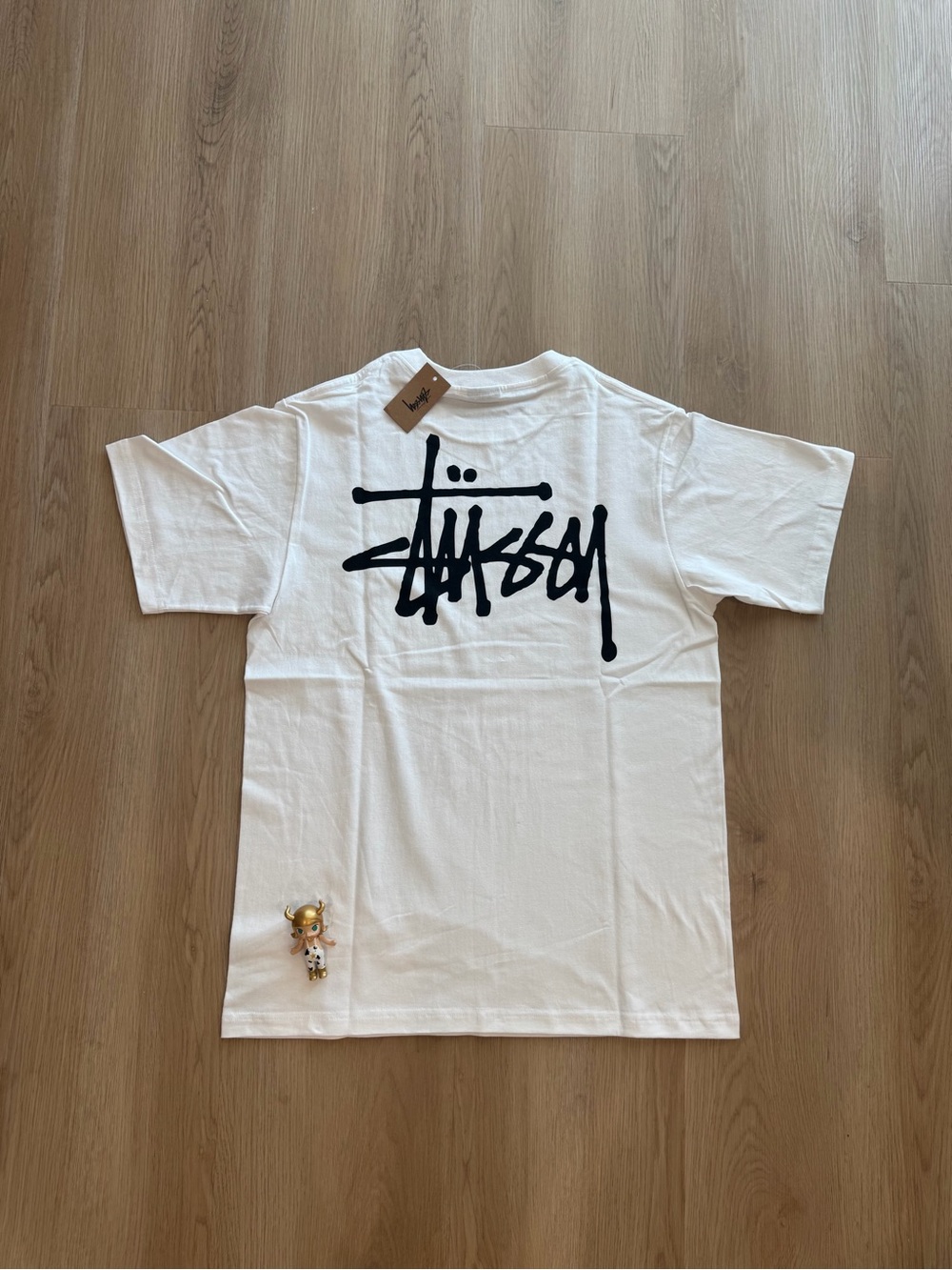 Stussy White Short Sleeve Tee with Black Script Logo